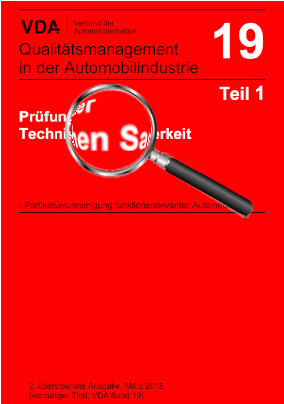 Eine Lupe vergrößert einen Teil des Buchtitels "Prüfung der Technischen Sauberkeit" des VDA 19, Teil 1.